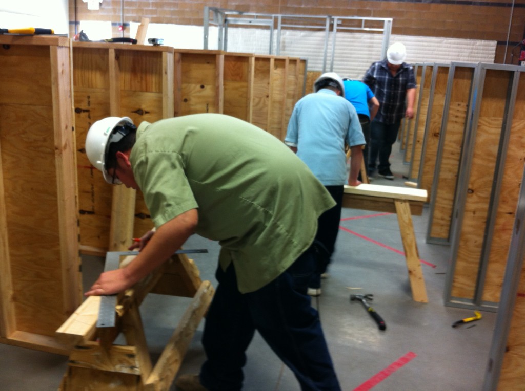 High school students take part in the construction course at ABC New Mexico through the school's Running Start program